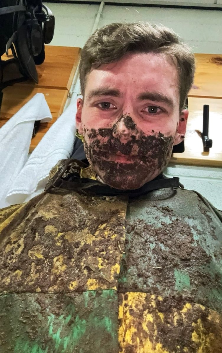 A mud-splattered Jonjo O'Neill Junior after the race