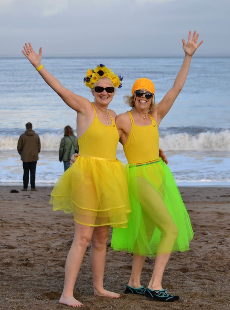 Friends from Minehead Mermaids in rocking vibrant yellow outfits.
