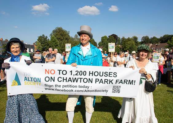 <p>The Say No To Chawton Park Farm protest has been going on for years - members of The Alton Society in Regency dress are pictured campaigning against earlier proposals in September 2021.</p>