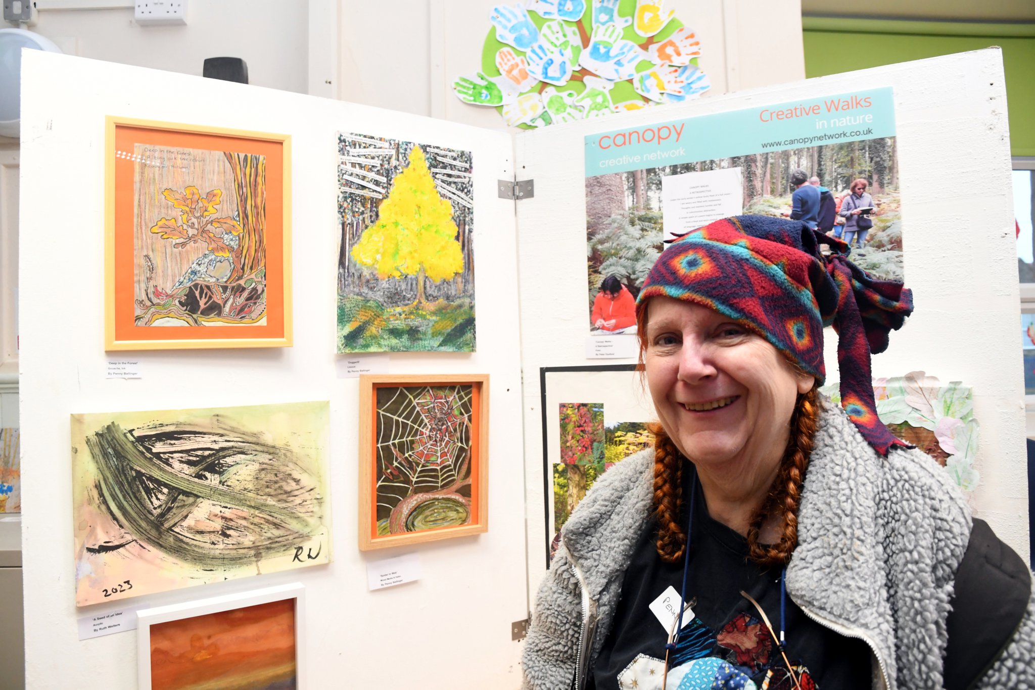 Penny Ballinger's mixed media piece Spider in the Web includes a haiku