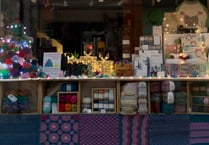Yarn shop gifts hats to city charities