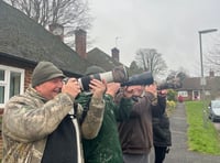<p>Birdwatchers Richard Kernachan, Shean King and and Simon Thorn wait for the perfect photo of a waxwing at Haven Way opposite Farnham Hospital</p>