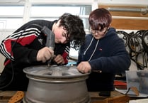 Pupils maintain cars as part of lessons ahead of entering the world of work