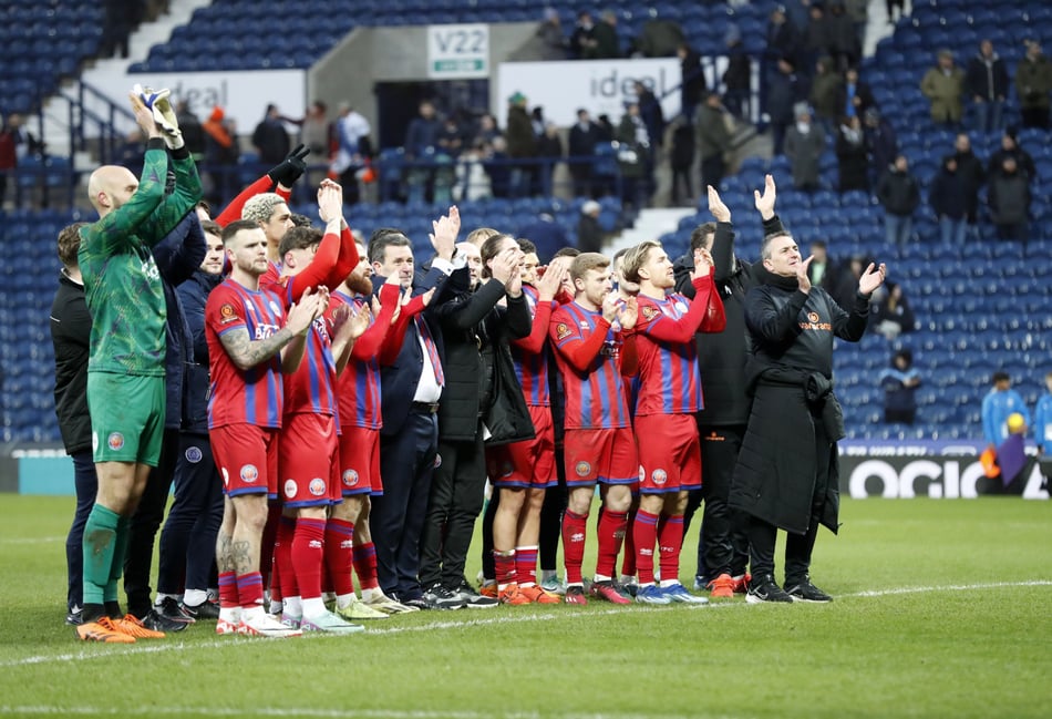 <p>Aldershot Town's players and management thank the fans</p>