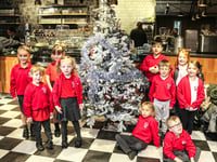 Badshot Lea Village Infant School pupils bring festive cheer