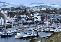 9 picture show the Isle of Man in the snow