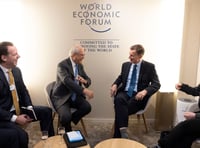 <p>Chancellor Jeremy Hunt talks to chairman of AstraZeneca Michel Demare, at Davos 2024</p>