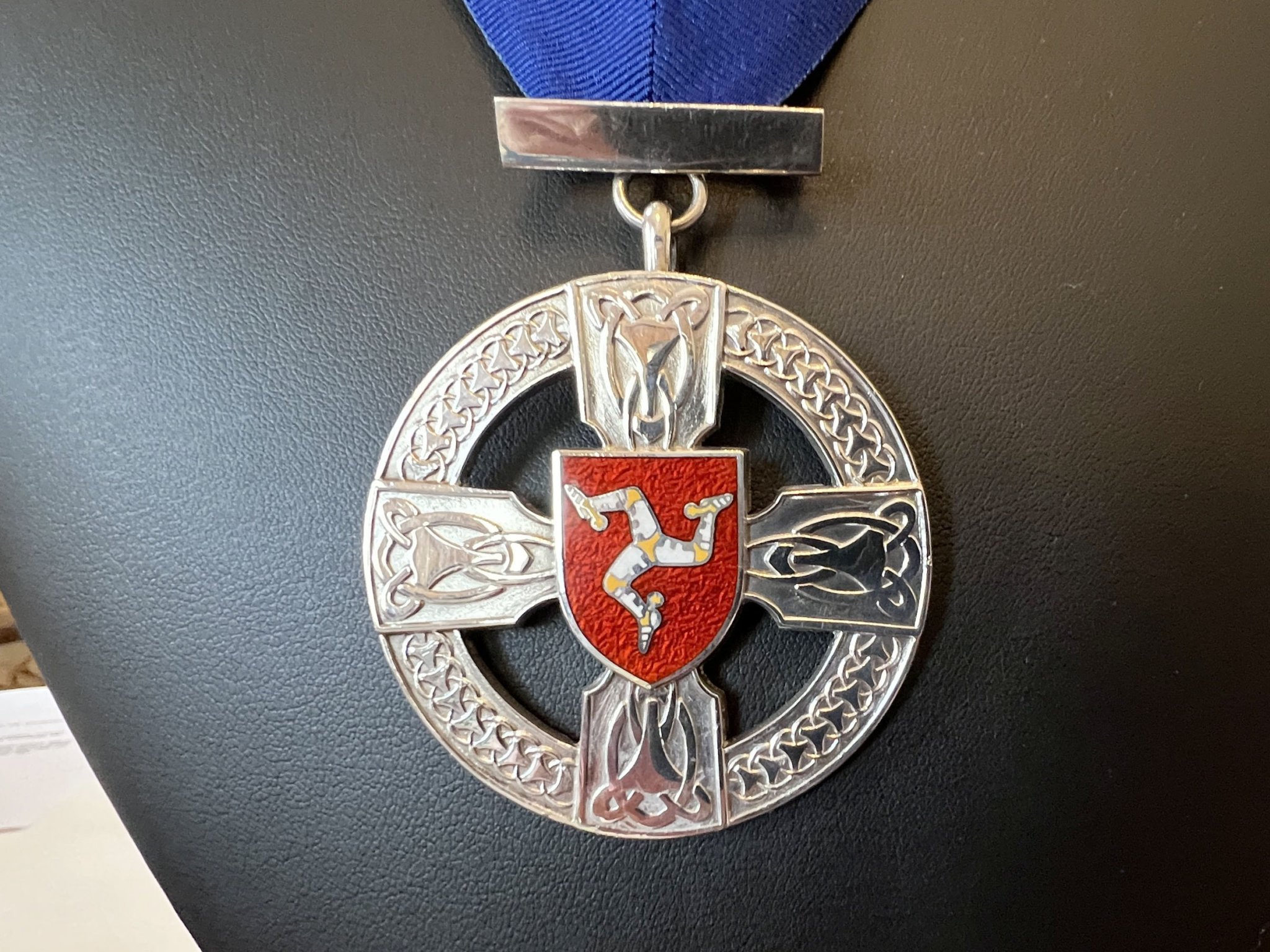 The swearing-in of Peter Quayle as Captain of the Parish of Malew at Government House - Captain of the Parish medal