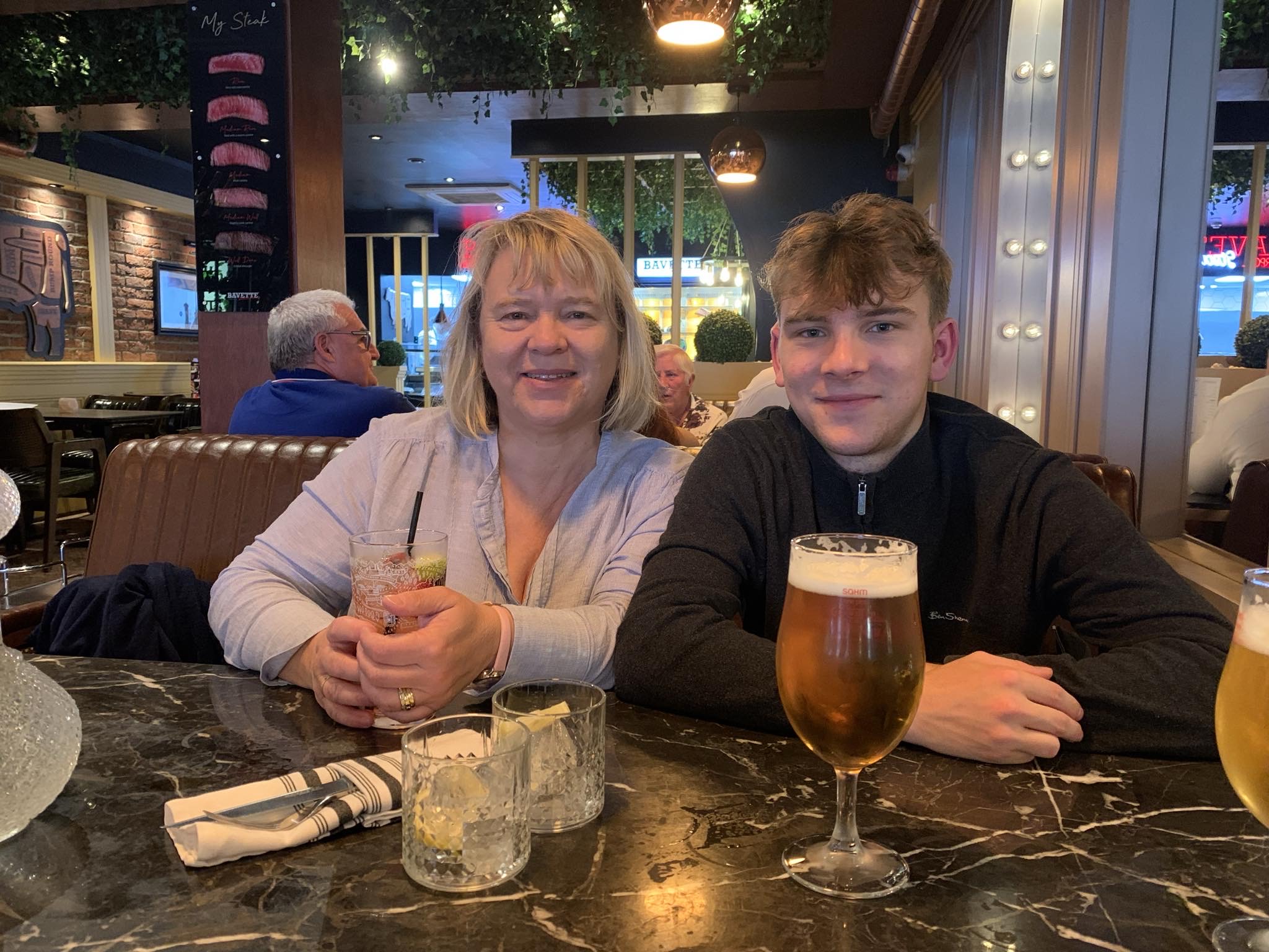 Lucas Martin with his mum Nicola after his graduation last September