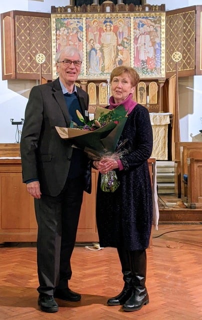 HHH Concerts chairman Stephen Dennison presents its new honorary patron Dame Ann Murray with a bouquet at St Christopher's Church in Wey Hill, Haslemere, on January 24th 2024.