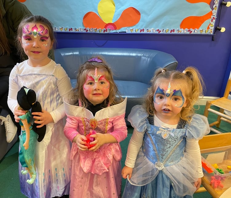 Disney princesses for thee day, from left, Millie, two, Eleanor, two, and Poppy, five