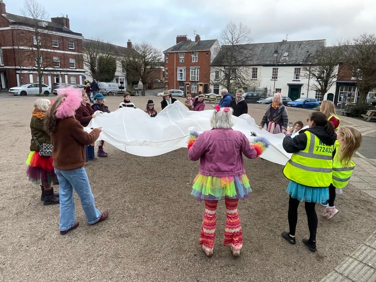 Parachute games were enjoyed at Tutu Day in Crediton. AQ 4820