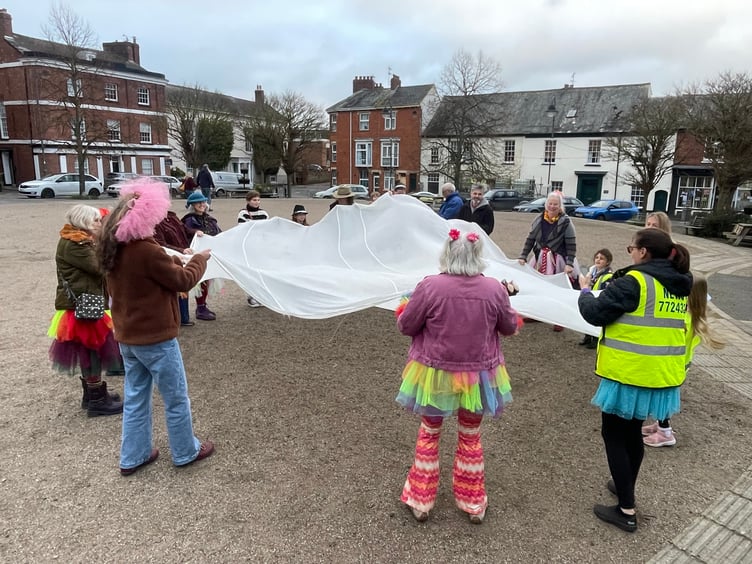 Parachute games were enjoyed at Tutu Day in Crediton. AQ 4821