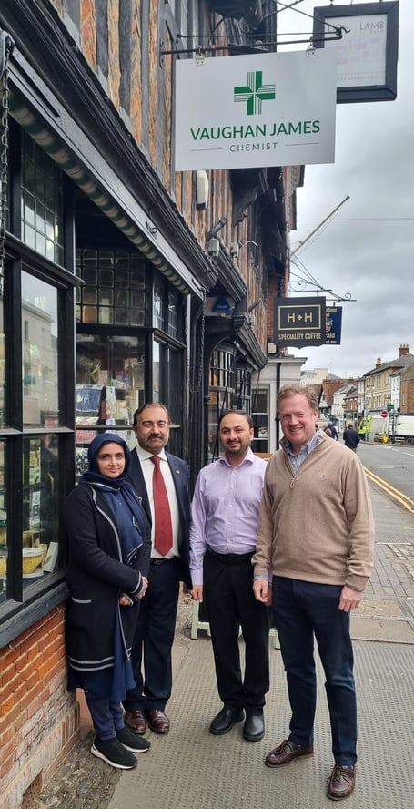 Conservative parliamentary candidate for Farnham & Bordon, Greg Stafford (right) outside Vaughan James Pharmacy in Farnham