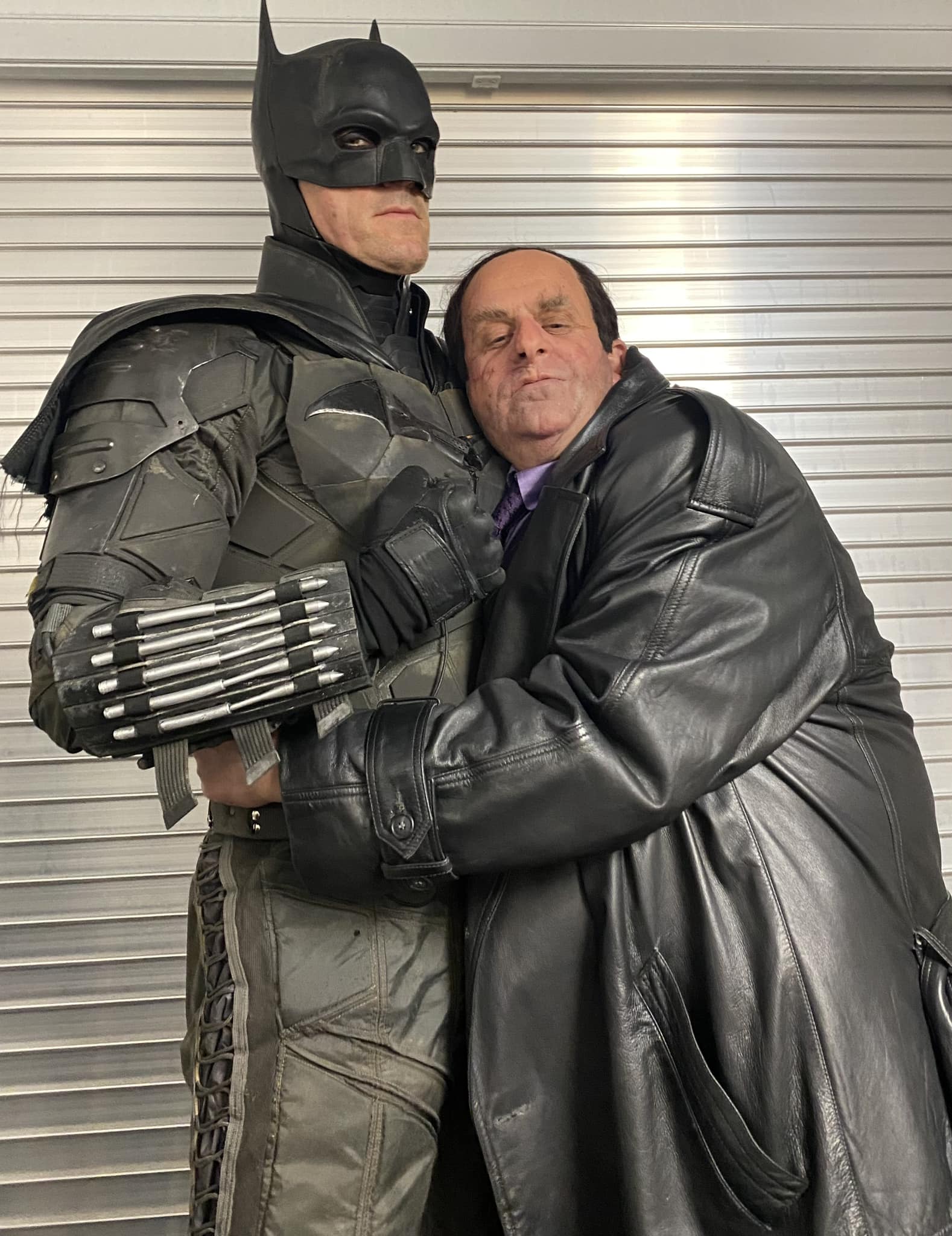 Mark Higgins in full makeup as the ‘Penguin’ in the 2022 film ‘The Batman’ (main) and in his rally driving attire (inset)