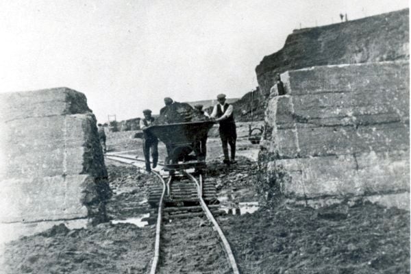 Workmen set the foundations for the sea pool