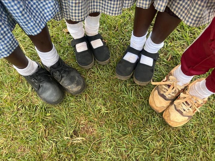 Kenyan school children with shoes from Liphook residents