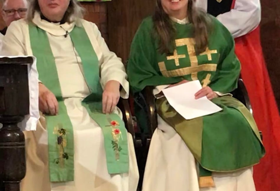 <p>Alan and Lesley Crawley with Bishop Paul (standing)</p>