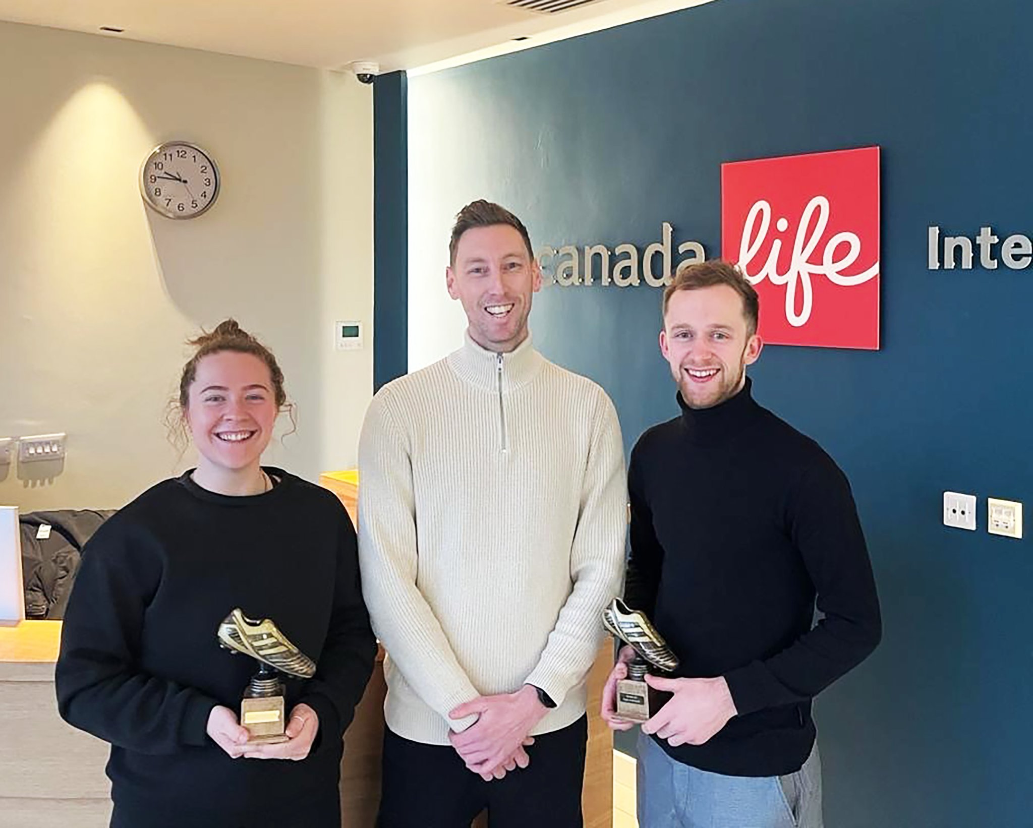 Canada Life December/January Players of the Month Becky Corkish and Adam Mealin (right) with Dan Pownall from award and league sponsor Canada Life International
