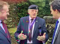 <p>Jim Edwards, past president of Hindhead Royal British Legion, chats to Greg Stafford and Johnny Mercer</p>