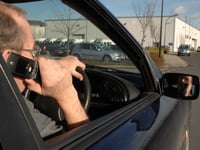 Total fines issued in Surrey for using a mobile phone while driving  has doubled following law change