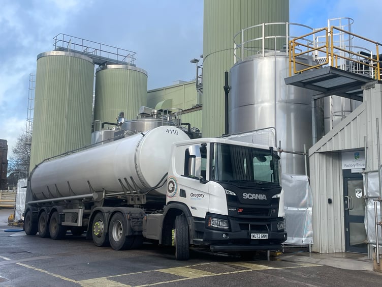 A tanker in front of a part of the Crediton Dairy factory. AQ 5486