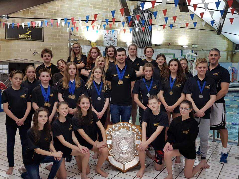 Tavistock Swimming Club members with their dedicated coach James Lake, far right.