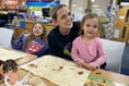 Children turn cave painters in library art sessions