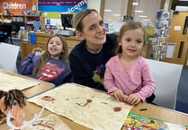 Children turn cave painters in library art sessions