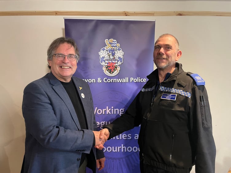 The Liberal Democrat Prospective Parliamentary Candidate for Central Devon, Mark Wooding meeting West Devon Police Neighbourhood team officer Kevin Williams. AQ 5901