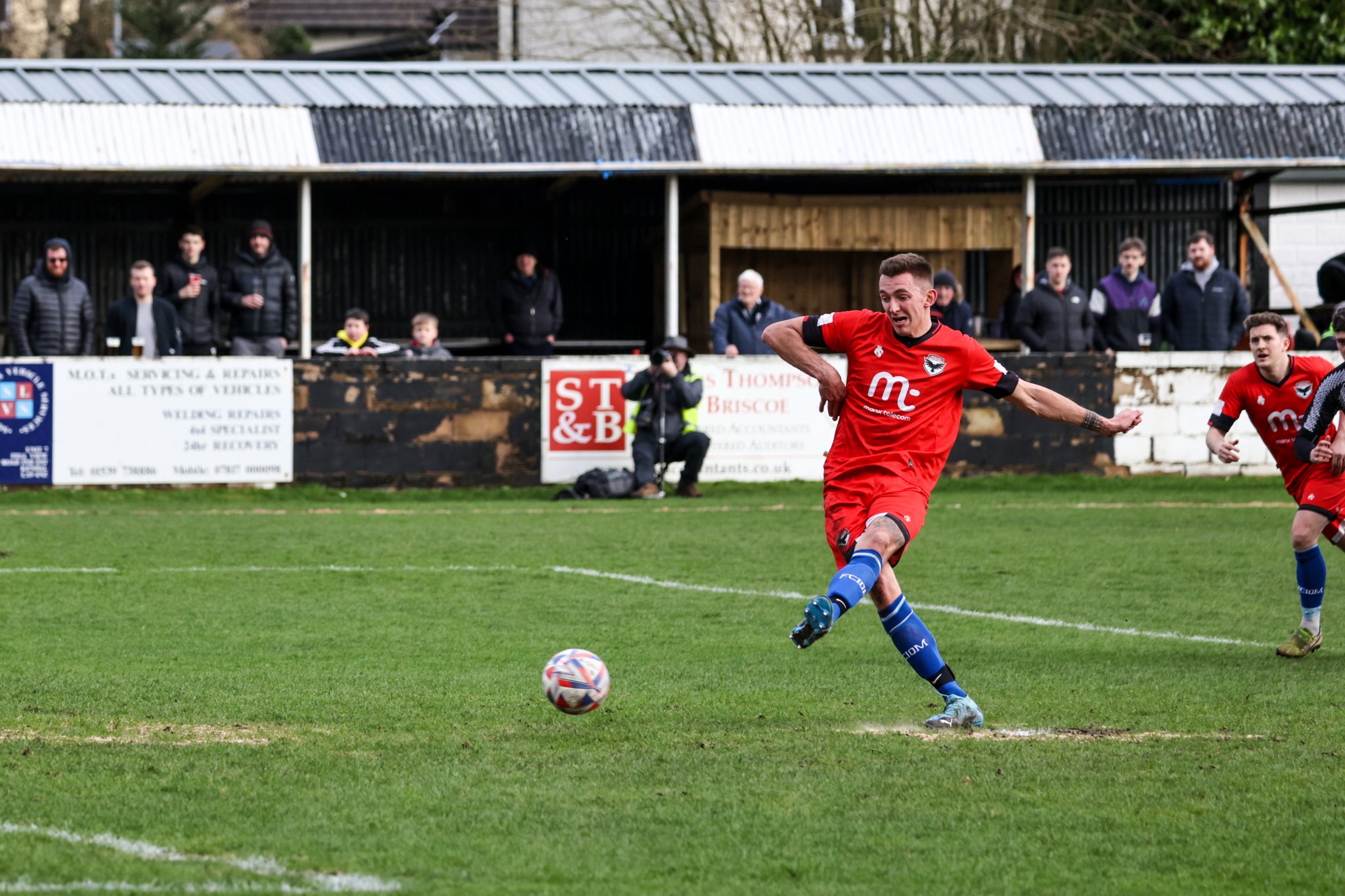 FC Isle of Man’s Sean Doyle fires home from the penalty spot to score his sides’ consolation goal on an otherwise tough day away at Kendal Town. The home team won the North West Counties Football League Premier Division clash 6-1 (Photo: Gary Weightman)