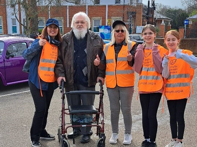 Hermon Frost, organiser of the Farnham Classic & Vintage Car Show, with his daughter, granddaughter and great grandchildren