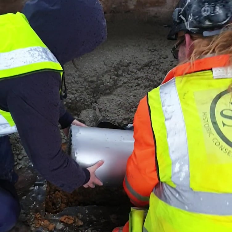 The time capsule was placed below the Storm Tower’s foundations