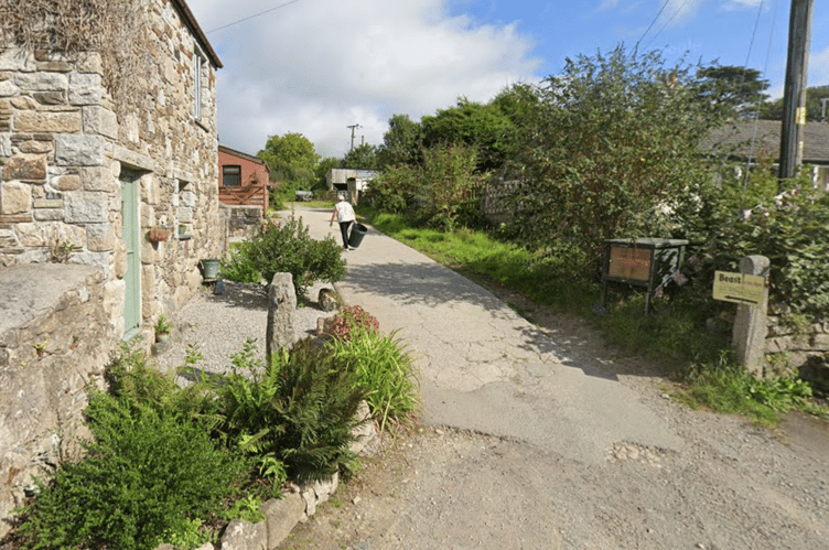 The location of the proposed development, behind the red brick house
