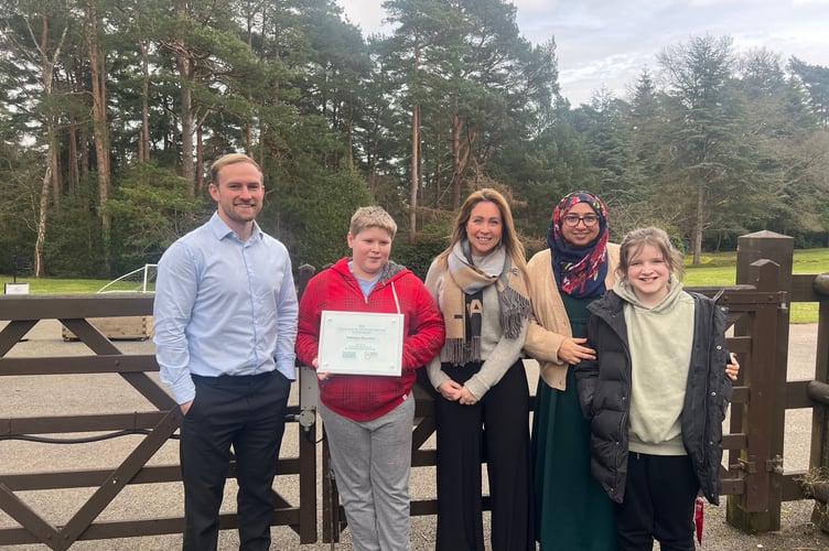 Staff and students with the award.