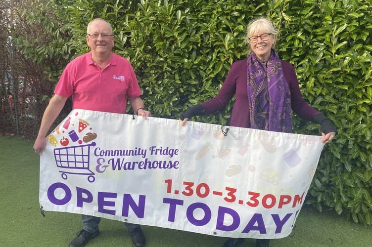 Bourne Show Chair Roger Goscomb with Reverend Sandy Clarke at the Brambleton Community Fridge.
