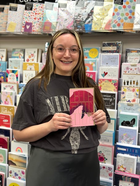 Claire Brown with her winning card design at Card Connection offices in Farnham