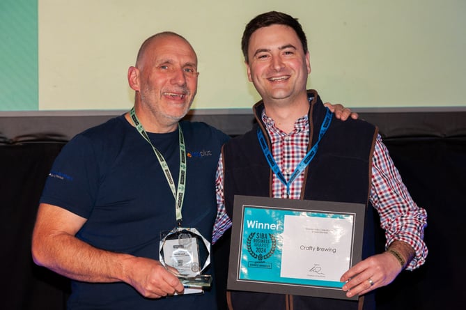 Crafty Brewing founder Luke Herman (right) receives the SIBA Business Award