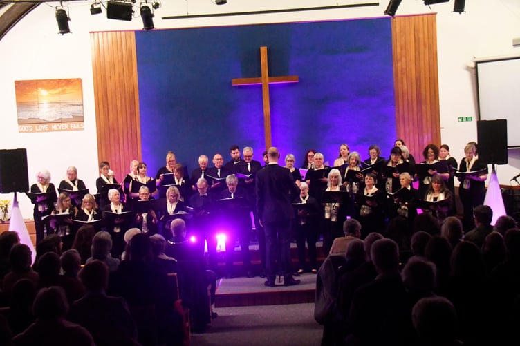 The Forest Singers conducted by Lewis Hutton.