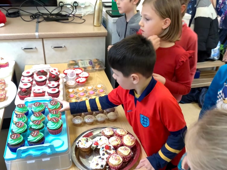 Having fun and wearing red for Red Nose Day at Yeoford Primary School.