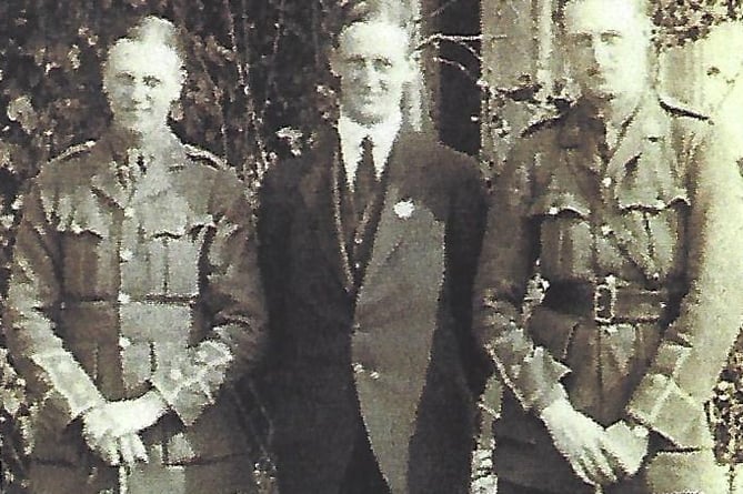 Eric Neres (right) with brothers Owen (left) and Llewellyn (centre)