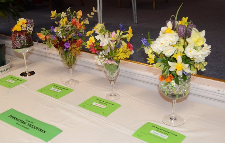 Winners of the Treasures in Wine Glass class at Bicknoller Spring Flower Show.
