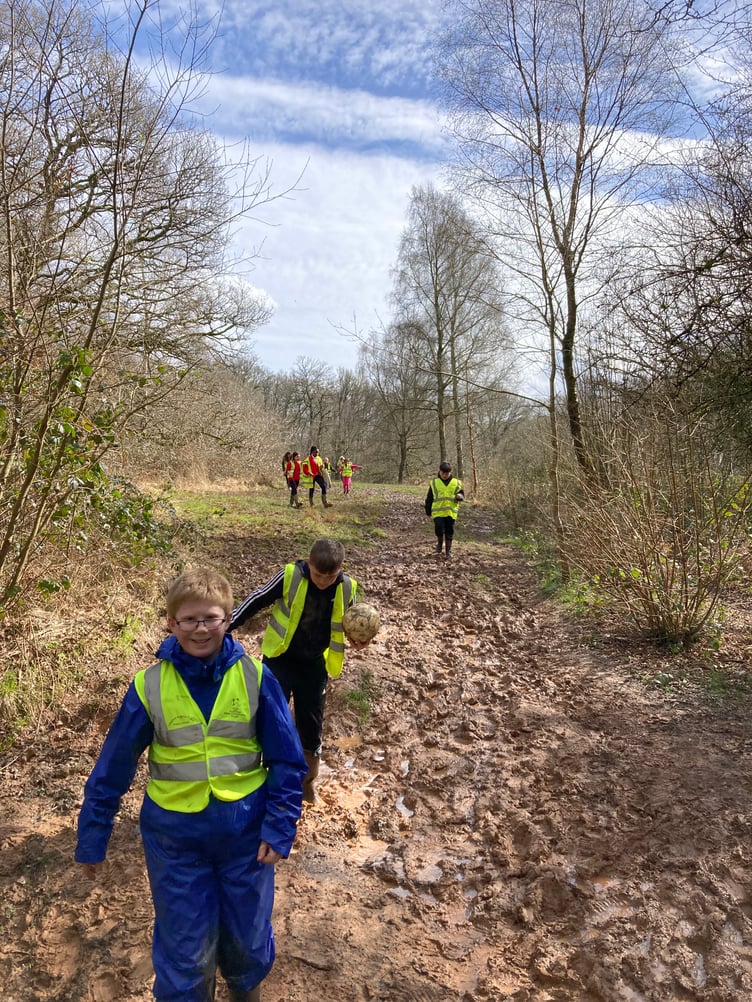 Muddy trails were overcome as Langford Budville School pupils raised money from a sponsored walk.