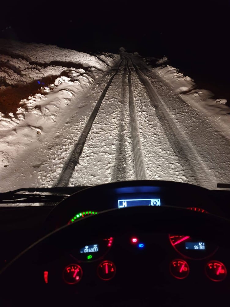 The view from a snow plough cab of an Exmoor road on Wednesday night. PHOTO: Somerset Council.