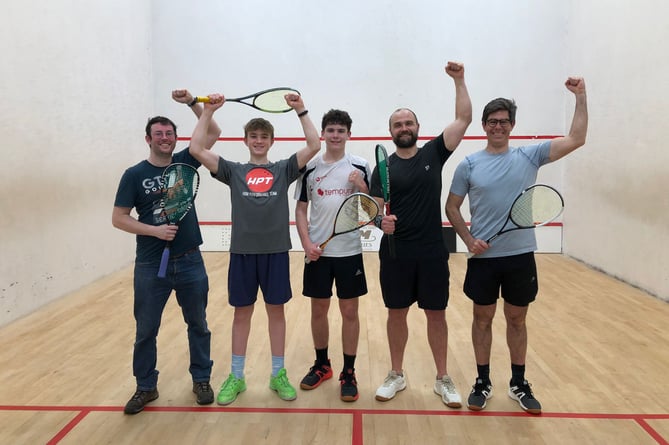 Ed Easton (left), Will Aldridge, James Graham, Olly Truelove and Mark de la Haye (right) celebrate after Petersfield Squash Club's second team clinched the Hampshire Division Four title