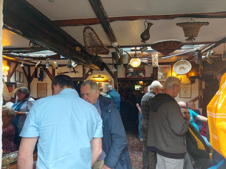 Locals and pub goers gathering to show their support for the Hole in the Wall