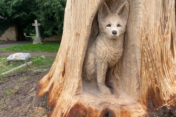 Michael Jones fox carving in West Street Cemeterey