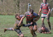 Local rivals lock horns in annual charity rugby match