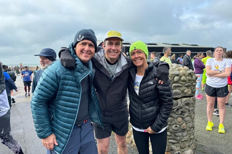 A FAMILY AFFAIR: Sammy French completes the Brighton half marathon accompanied by her brothers