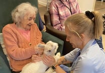 Surprise visit by a spring lamb brings joy to care home residents